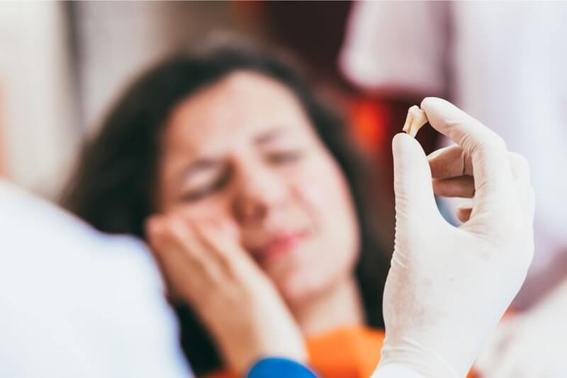 patient experiencing nerve pain after tooth extraction patient experiencing nerve pain after tooth extraction