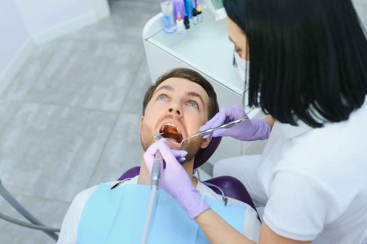 man undergoing dental check up in cypress man undergoing dental check up in cypress