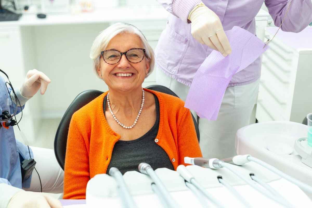 elderly smiling after family friendly dental care elderly smiling after family friendly dental care