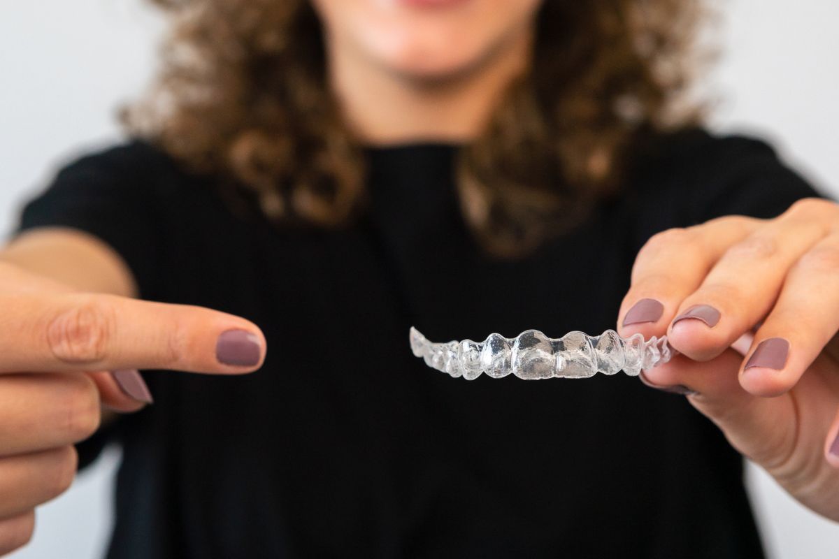 dentist explaining orthodontic treatment timeline dentist explaining orthodontic treatment timeline