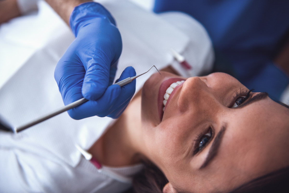 Houston dentist consulting with a new patient Houston dentist consulting with a new patient
