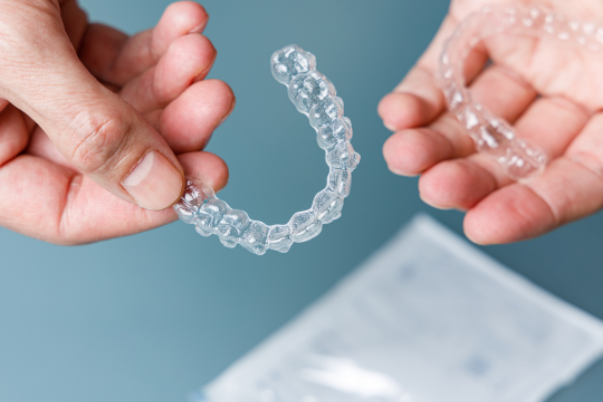 Patient discussing Braces & Invisalign® options with an Austin orthodontist Patient discussing Braces & Invisalign® options with an Austin orthodontist